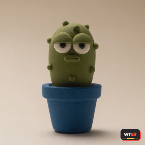 A short sage green clay cactus in a plain cobalt pot gives the camera a flat, unimpressed stare, blinks once very slowly, leans in toward the lens as if to make sure it heard that right, then settles back exactly where it started.